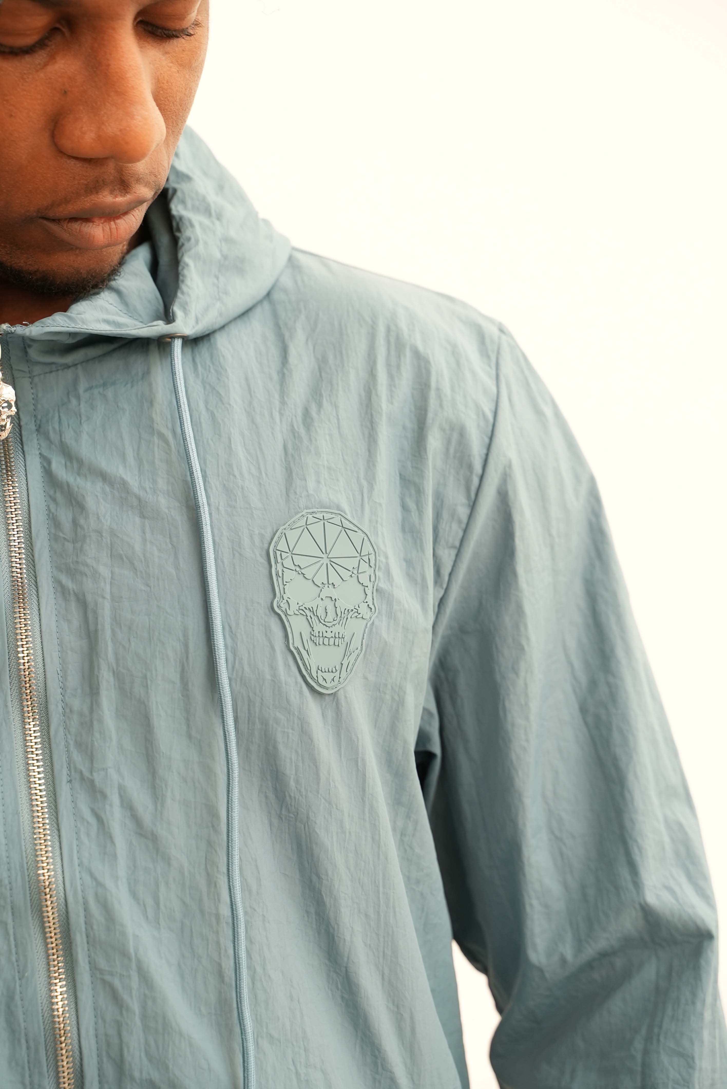 Amico skull badge windbreaker Steel Blue